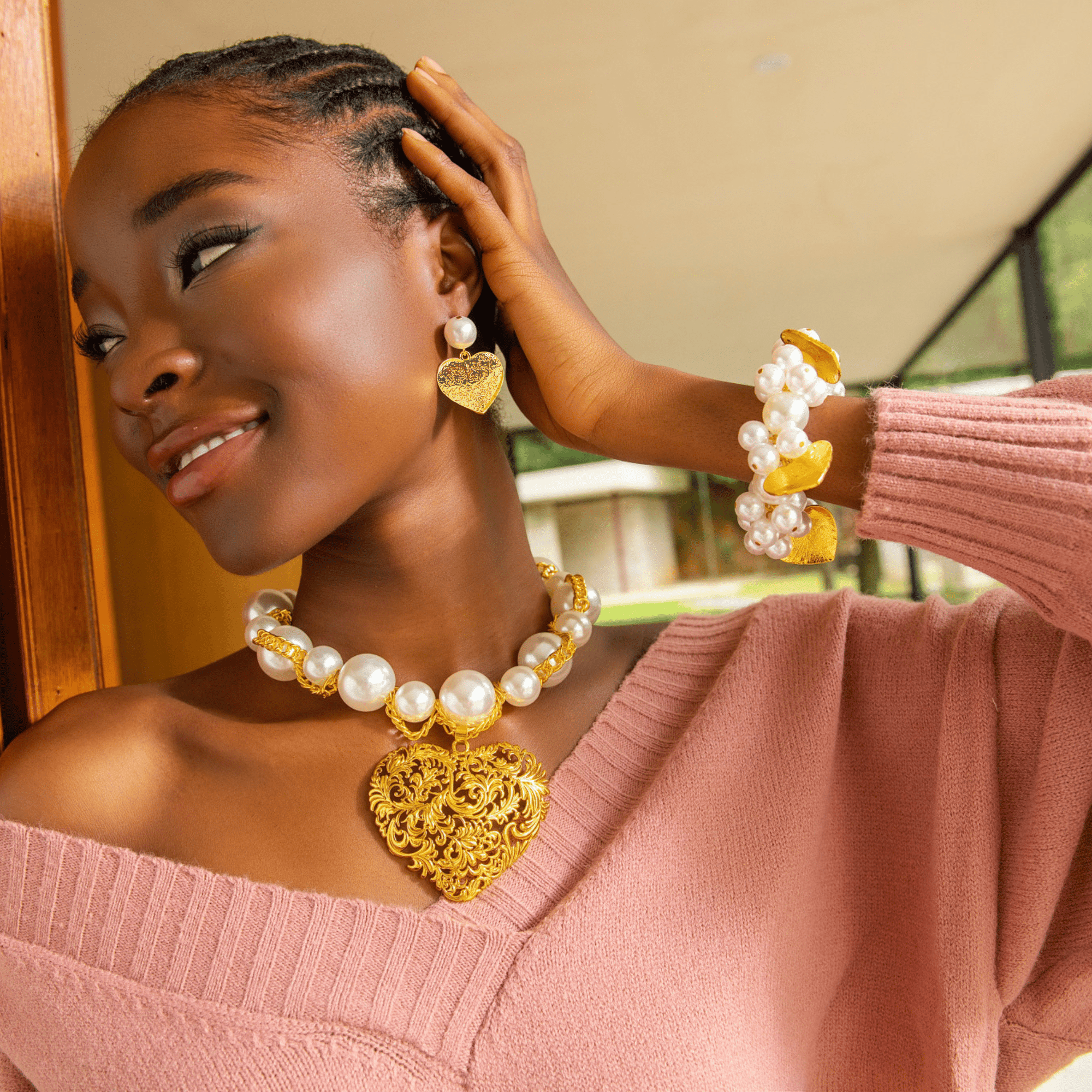 Amora Chunky Pearl Heart Chain styled with pearl bracelet and earrings – romantic luxury look.