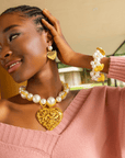 Amora Chunky Pearl Heart Chain styled with pearl bracelet and earrings – romantic luxury look.