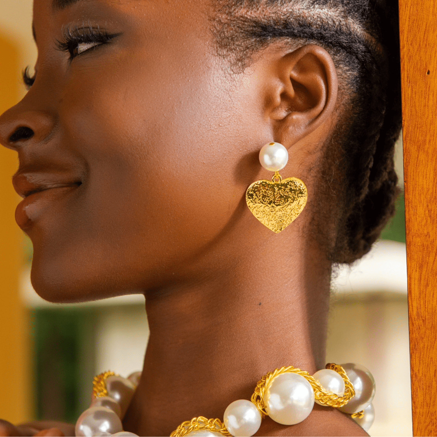 Amora Pearl Heart Dangles – Ivory/Gold with pearl studs and gold heart drops.