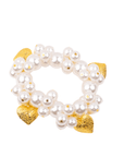 Amora Pearl Heart Stretch Bracelet – Ivory/Gold with glossy pearls and gold heart charms.