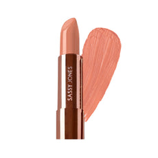 Sassy Jones Birthday Suit Luxe Crème Lipstick with nude-peach swatch, moisturizing satin-matte finish.