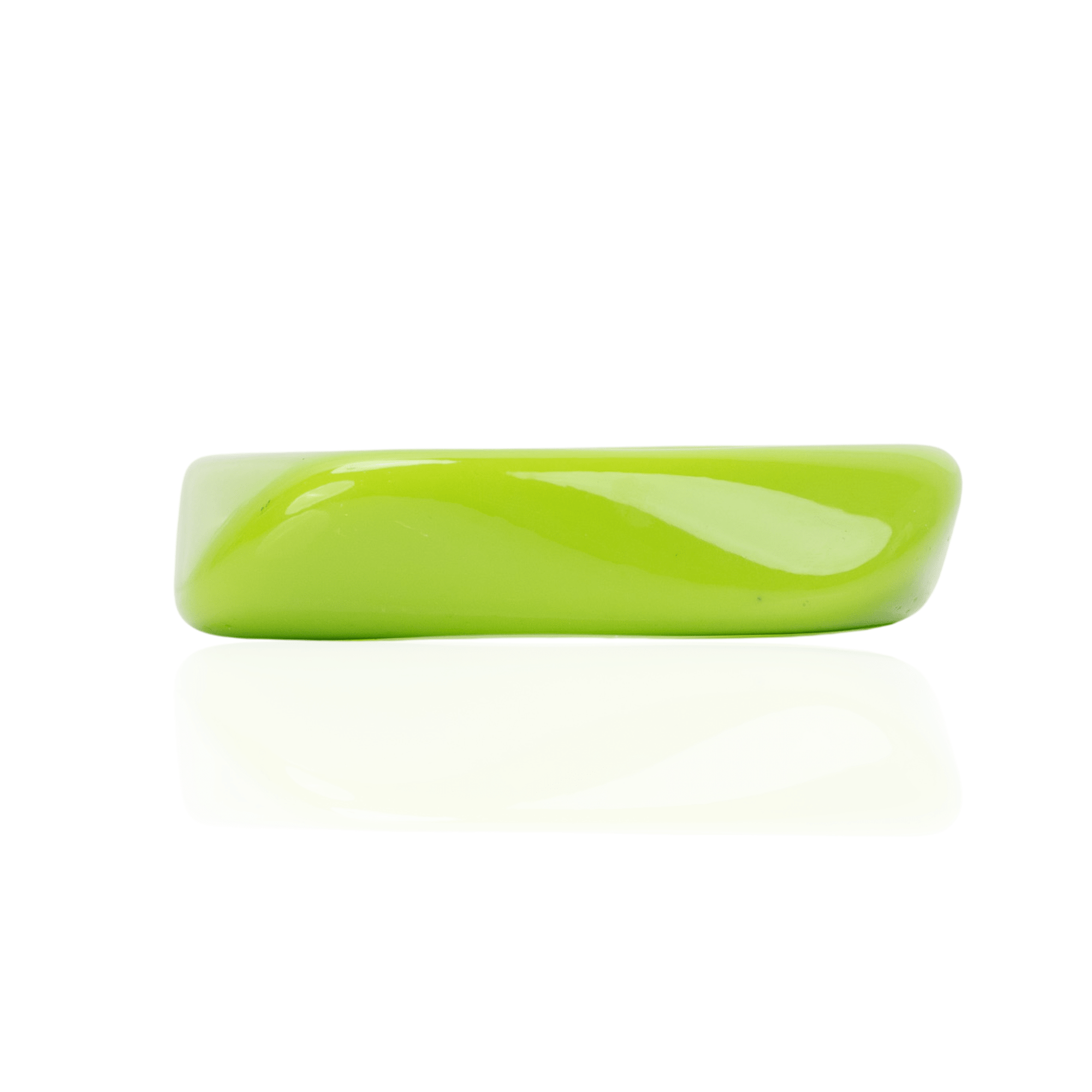 Glossy lime green resin bangle bracelet with smooth sculptural silhouette on a white background.