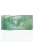 Wide seafoam green marbled resin cuff bracelet with glossy finish on a clean white background.