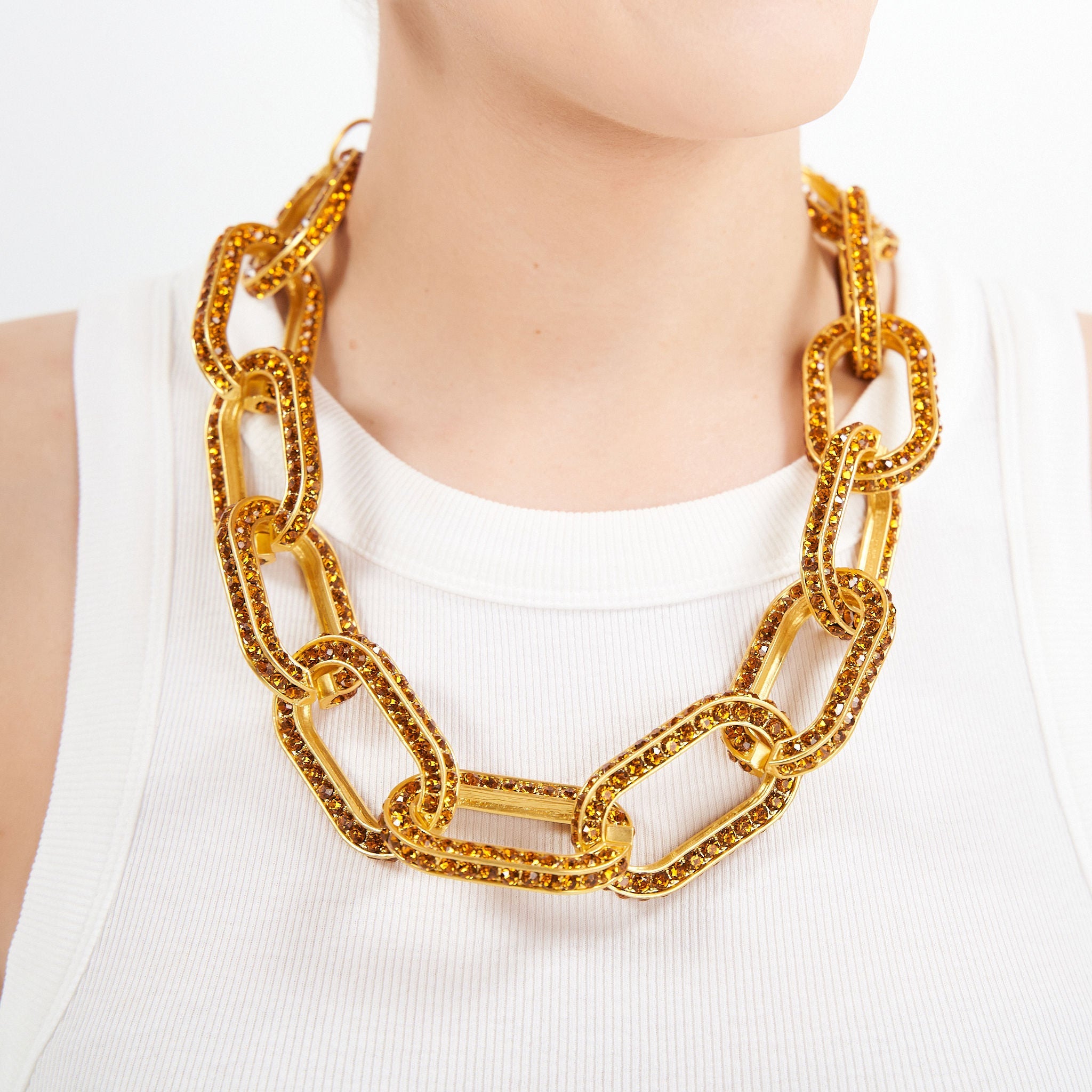 Kerri Chain - Gold - Sassy Jones - -Oversized interlocking chain links -Inlaid with golden Colorado topaz crystals -Matte gold metal hardware -6-inch extender and easy hook closure