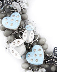 Lovebug Greige Jewelry Unique Beaded Necklace Grey Statement Necklace Heart Shaped Earrings Fashionable Greige Jewelry Designer Lovebug Necklace Trendy Grey Accessories Artistic Statement Jewelry Beaded Lovebug Jewelry Set Elegant Grey Fashion Jewelry High Fashion Beaded Necklace