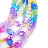 Malia Glass Sparkler - Rainbow Ombre (Detachable Layers) - Sassy Jones -9-strand design in a rainbow ombre cascade of pink, yellow, blue, green, and lavender beads -4 lower strands are detachable for versatile wear -Hand-strung faceted glass AB beads  -Dangling larger glass pendants on 2 strands  -Collar length -Silver metal hardware 