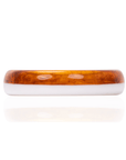 Amber marbled and ivory resin bangle bracelet with glossy finish on a white background.