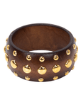 Brown honeywood inspired statement bangle bracelet with gold dome stud embellishments on a white background.