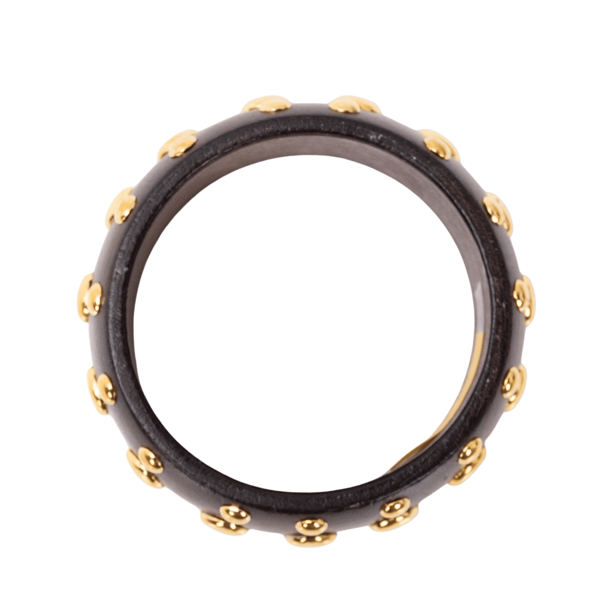 Brown honeywood inspired statement bangle bracelet with gold dome stud embellishments on a white background.