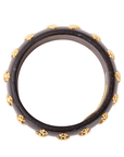 Brown honeywood inspired statement bangle bracelet with gold dome stud embellishments on a white background.