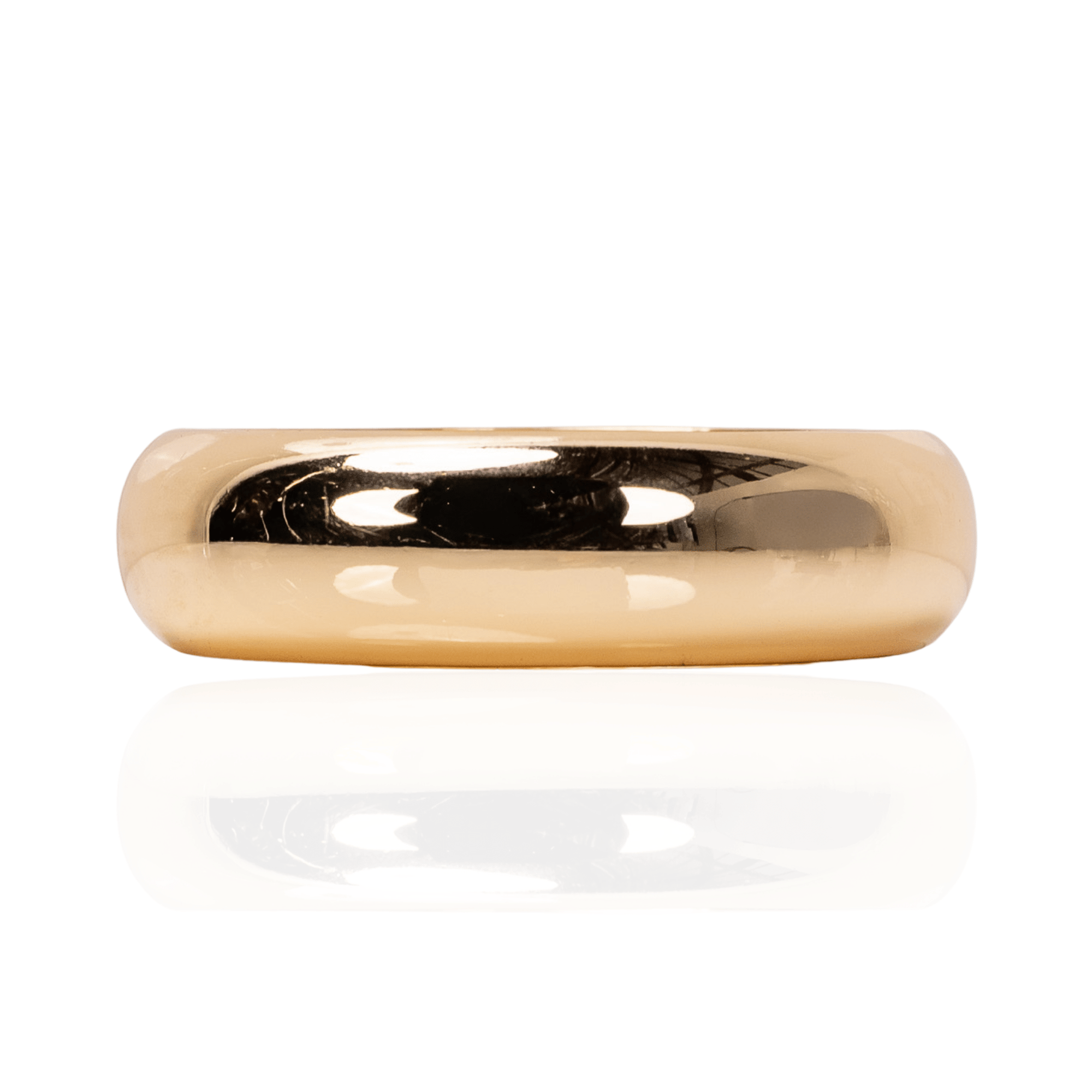 Glossy champagne gold resin bangle bracelet with smooth rounded silhouette on a white background.
