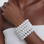 Ivory Beaded Bracelet Statement Jewelry African-Inspired Jewelry Bold Fashion Accessories Chunky Beaded Jewelry White Beaded Bracelet Handmade Beaded Necklace Ethnic Jewelry Collection Unique Fashion Jewelry High-Quality Beaded Accessories Elegant Beaded Jewelry Fashionable Bead Bracelet Luxurious Jewelry Designs Trendy Beaded Accessories