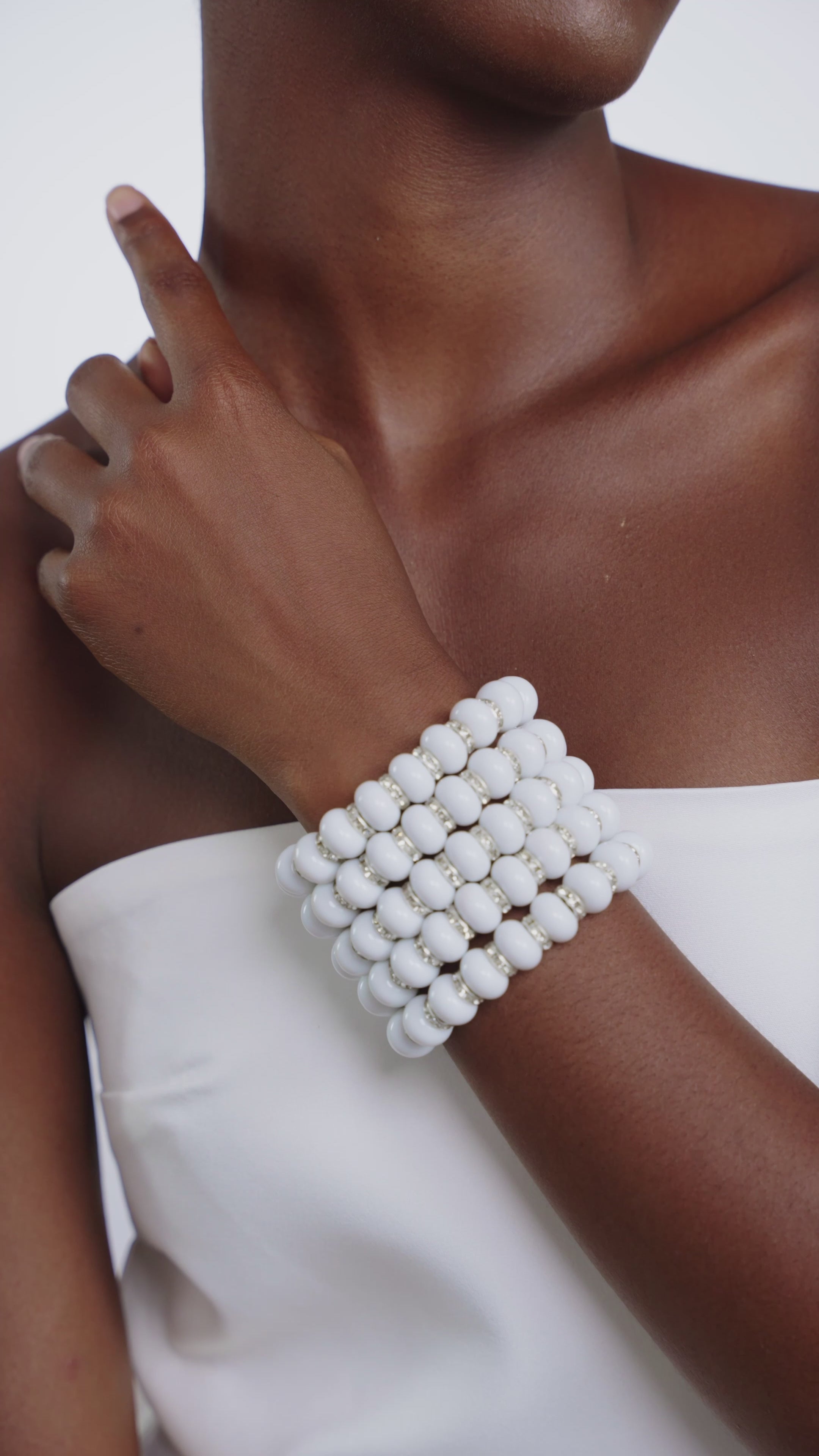 Ivory Beaded Bracelet Statement Jewelry African-Inspired Jewelry Bold Fashion Accessories Chunky Beaded Jewelry White Beaded Bracelet Handmade Beaded Necklace Ethnic Jewelry Collection Unique Fashion Jewelry High-Quality Beaded Accessories Elegant Beaded Jewelry Fashionable Bead Bracelet Luxurious Jewelry Designs Trendy Beaded Accessories