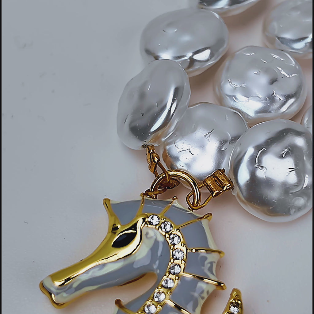 Harbor Grace nautical necklace with white baroque pearls, hand painted ocean charms and 18k gold plated accents.