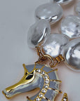 Harbor Grace nautical necklace with white baroque pearls, hand painted ocean charms and 18k gold plated accents.