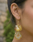 Chrysallis Natural Yellow Agate Dangle Earrings featuring sliced yellow agate drops with clustered yellow and clear beads.