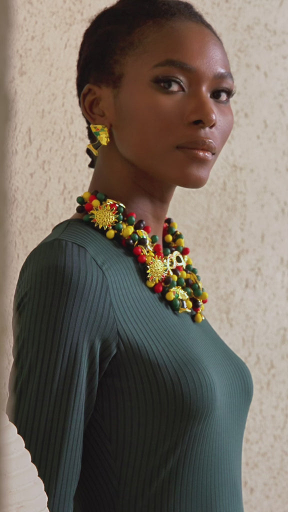 statement bib necklace, African statement necklace, bold statement necklace for women, cultural jewelry necklace, designer fashion necklace, artisan bib necklace, vibrant beaded necklace, luxury statement jewelry, boutique statement necklace, high impact necklace