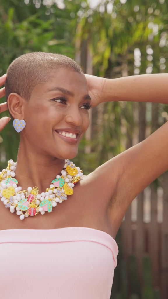 colorful beaded necklace, bug jewelry, insect jewelry, white necklace, summer jewelry, bright and bold jewelry, cute and colorful jewelry, statement necklace, Kendra Scott, sassy jones, tory burch, Alexis bittar, NYFW 2025