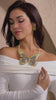 Gold butterfly statement bib necklace with champagne and clear crystals in a radiant oversized design.