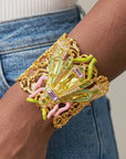 Jeweled beetle cuff featuring lemon, lilac and green stones with turquoise, pink and lime enamel accents.
