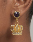 Sassy Jones Reign Pavé Crown Earrings featuring purple accents, champagne centers and ornate gold detailing.