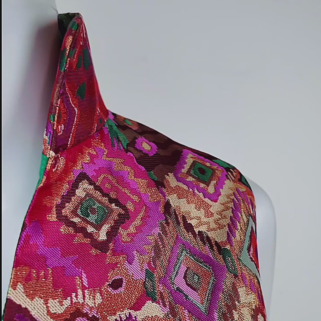 Front view of the Margaux Jacquard Shift Dress featuring a bold jewel toned geometric print.