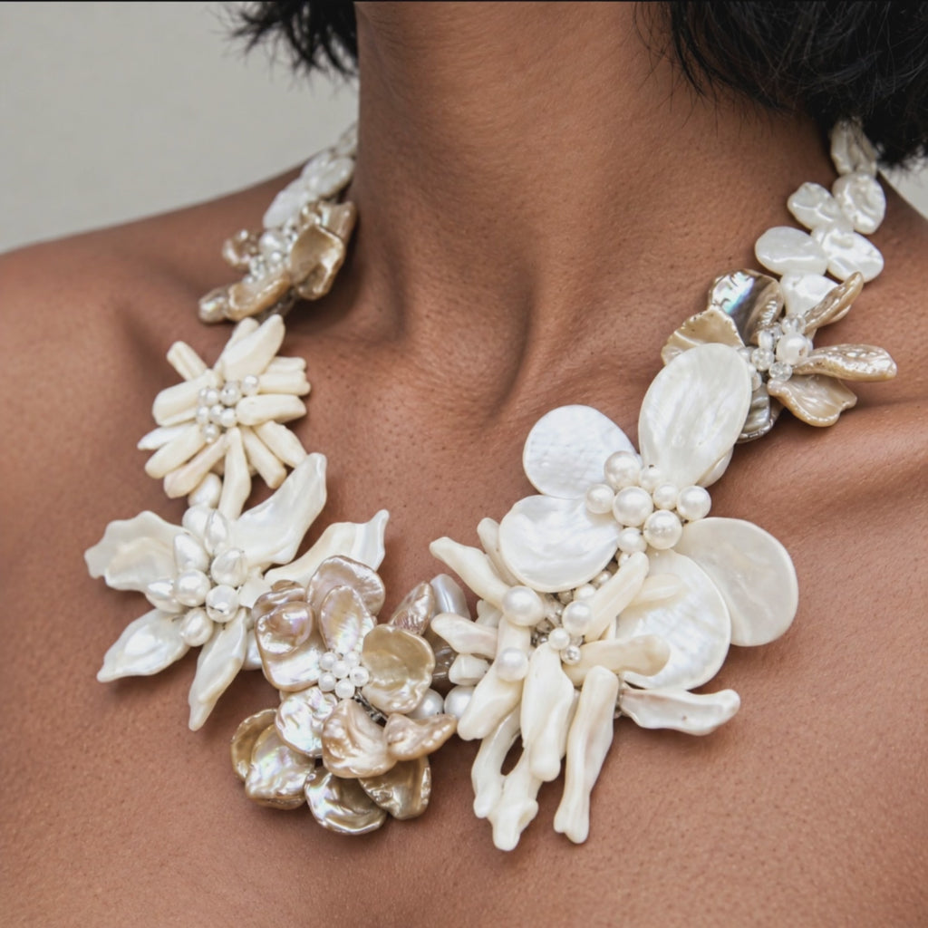Sassy Jones Wisteria statement necklace with luminous ivory and champagne Mother of Pearl floral details.