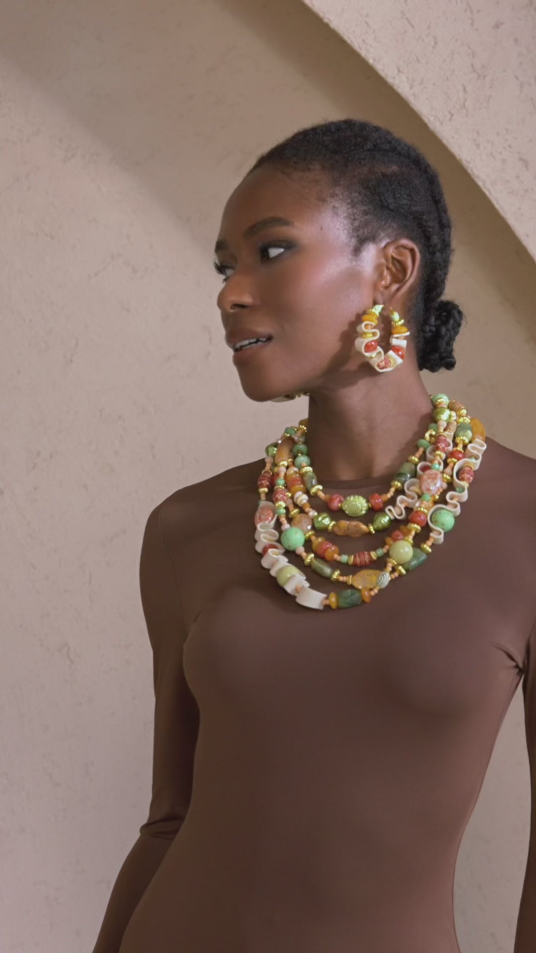 beaded hoop earrings, leather hoop earrings, statement hoop earrings, artisan earrings, wearable art earrings, fashion beaded earrings, bold earrings women, boutique earrings, luxury costume earrings, modern statement earrings