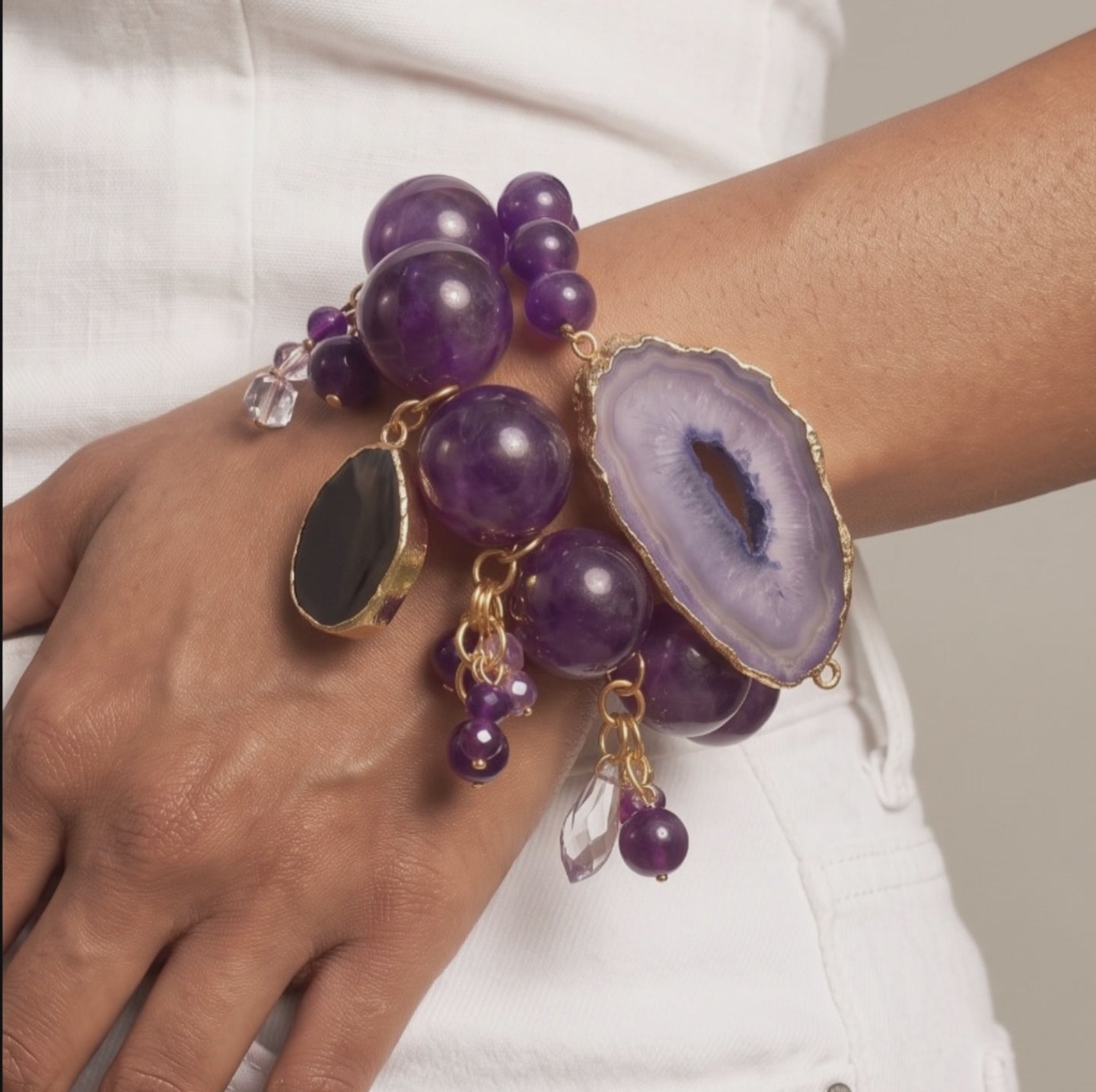 Two piece purple stretch bracelet stack with natural agate slices and chunky round beads.