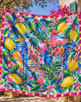 Colorful oversized square scarf featuring painterly botanical artwork and a hot pink border with yellow polka dots.