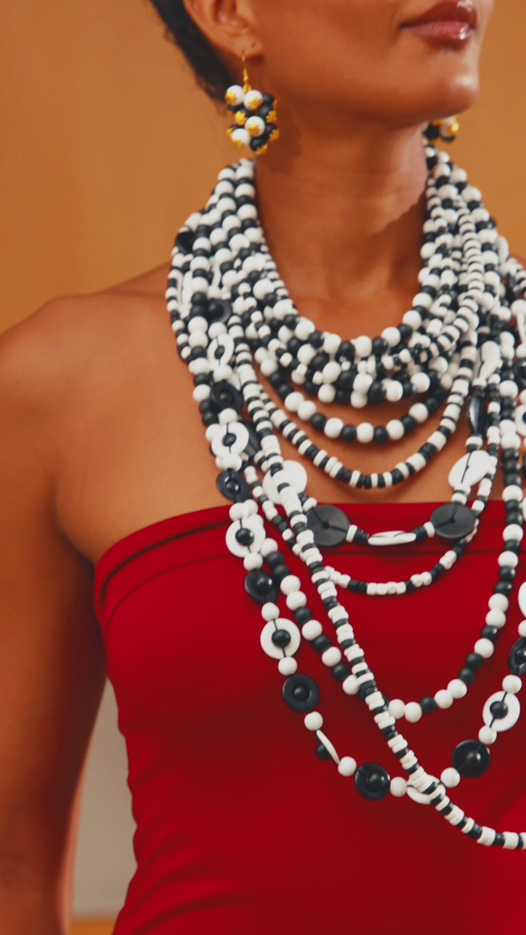 Ayoka necklace, black and white beaded necklace, wooden statement necklace, monochrome jewelry, cascading chain necklace, versatile 3-in-1 necklace, bold beaded necklace, handcrafted wooden necklace, black and white fashion jewelry, lightweight statement necklace