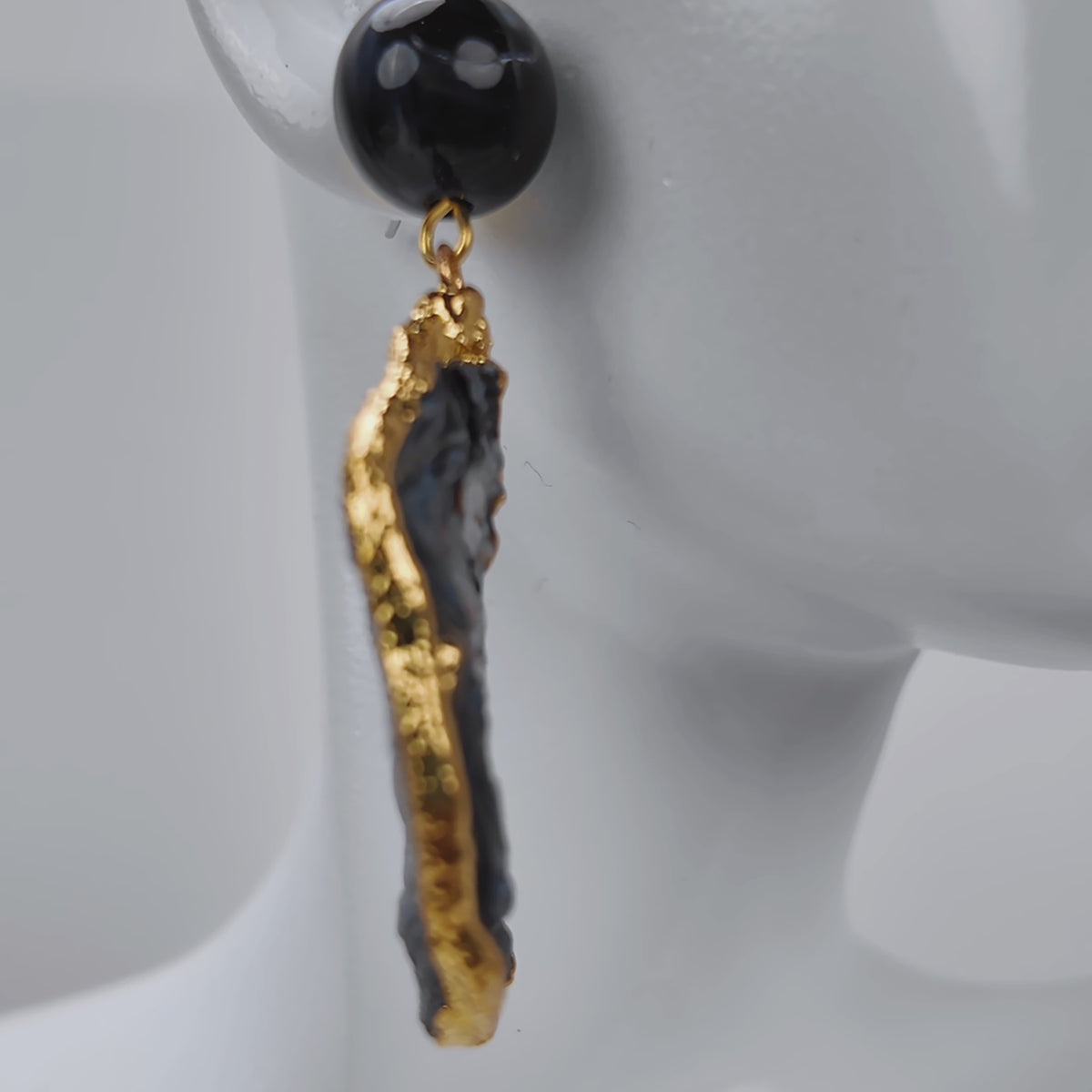 Sassy Jones Chrysallis earrings featuring one of a kind natural agate patterns in black, gray and ivory with warm gold detailing.