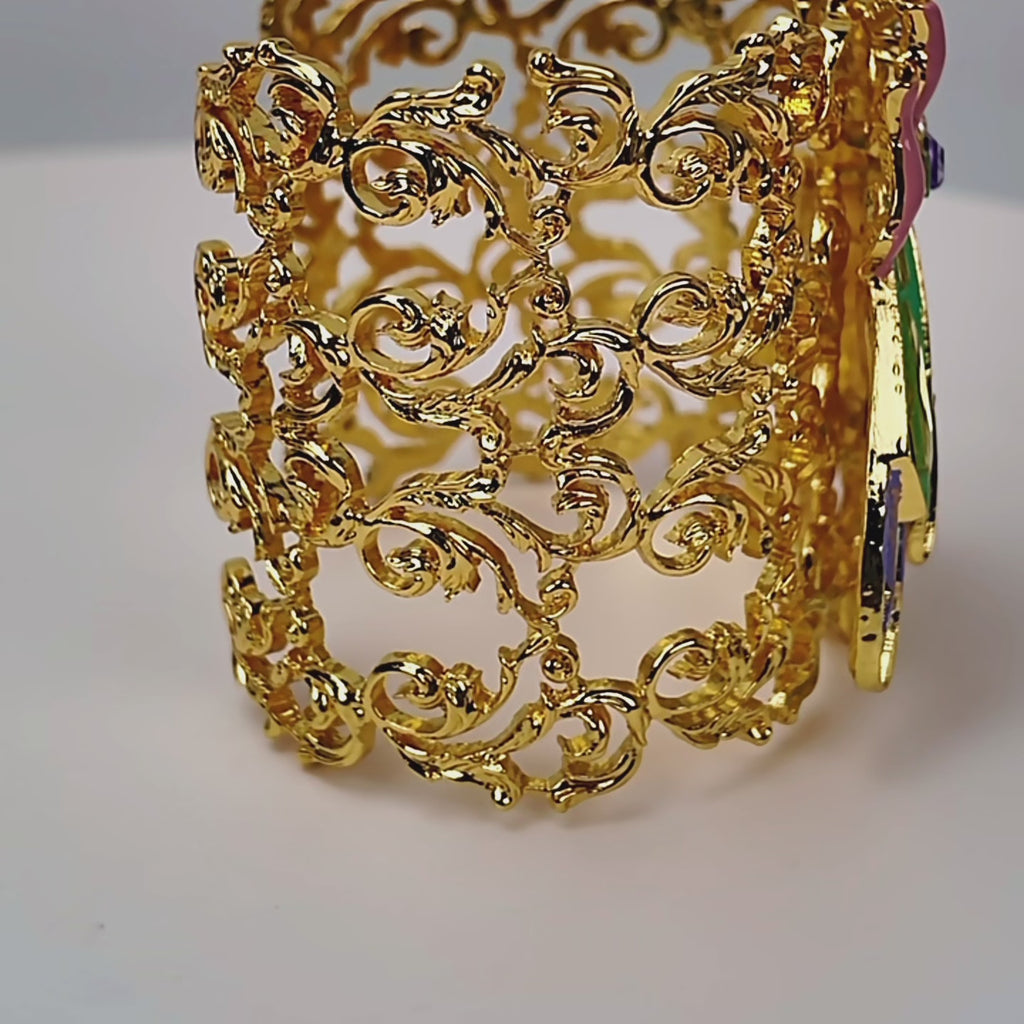 Jeweled beetle cuff featuring lemon, lilac and green stones with turquoise, pink and lime enamel accents.