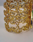 Jeweled beetle cuff featuring lemon, lilac and green stones with turquoise, pink and lime enamel accents.