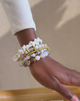 6 piece stretch bracelet stack with Botswana agate beads, ivory stone chips, and gold accents in neutral tones