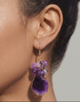 Natural purple agate earrings featuring organic stone patterns, purple bead clusters and fish hook closures.