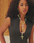 cross necklace, lariat necklace, gold cross necklace, statement necklace, luxury jewelry, women’s necklaces, fashion jewelry, religious jewelry, designer necklace, modern cross jewelry