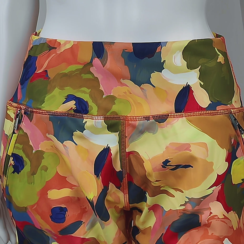 Full length multicolor leggings with bold painterly flowers and a sculpted high waisted fit.