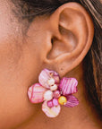 Wisteria Pink and Orange Abalone Earrings featuring sculptural flowers crafted from polished and wire woven mollusk shell petals.