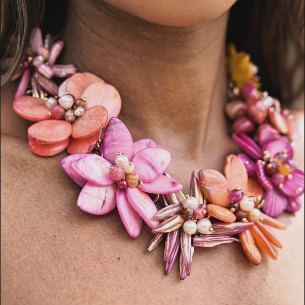 Pink and orange floral statement necklace featuring laser cut abalone shell petals, freshwater cultured pearls and Czech AB glass beads.