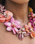 Pink and orange floral statement necklace featuring laser cut abalone shell petals, freshwater cultured pearls and Czech AB glass beads.