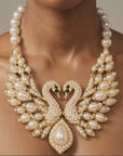 Anastasia Pearl Swan Statement Hinge Bib