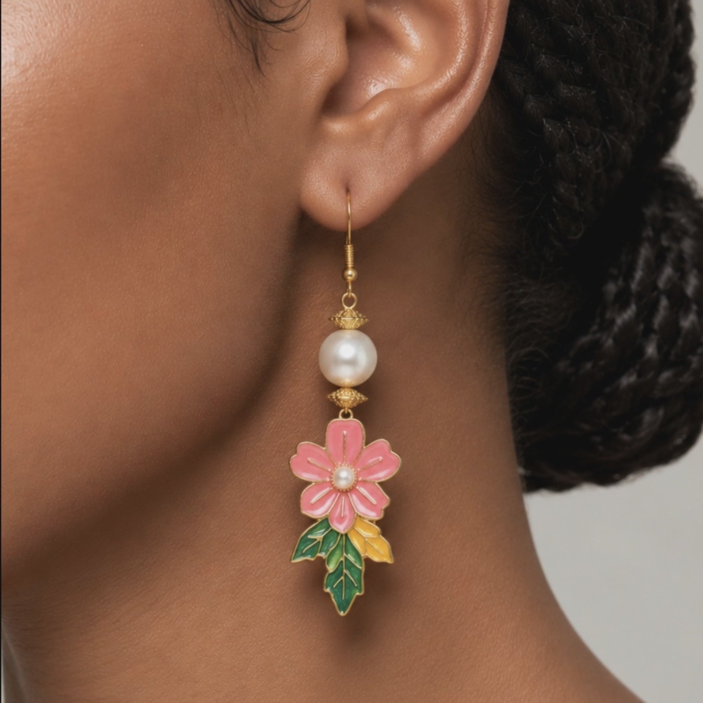 Sassy Jones Kalani tropical drop earrings featuring pink flowers, pearl inspired beads, and colorful leaf details