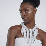 Ivory Beaded Necklace Statement Jewelry African-Inspired Jewelry Bold Fashion Accessories Chunky Beaded Jewelry White Beaded Bracelet Handmade Beaded Necklace Ethnic Jewelry Collection Unique Fashion Jewelry High-Quality Beaded Accessories Elegant Beaded Jewelry Fashionable Bead Necklace Luxurious Jewelry Designs Trendy Beaded Accessories