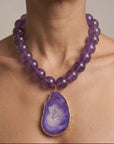 Chrysallis necklace with translucent purple agate beads and natural sliced stone pendant with crystal druzy center.