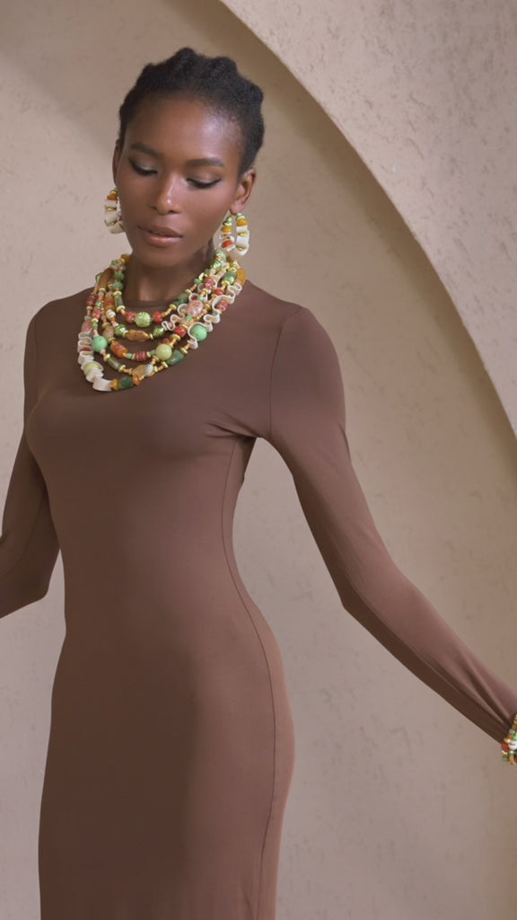 beaded collar necklace, leather statement necklace, artisan beaded jewelry, wearable art necklace, bold fashion necklace, multi strand necklace, boho luxury jewelry, handcrafted statement necklace, earthy tone jewelry, designer statement necklace