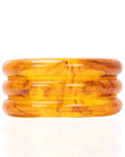 Triple layered amber marbled resin cuff bracelet with translucent honey and caramel swirls on a white background.