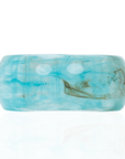 Glossy aqua marbled resin bangle bracelet with ocean inspired turquoise and pearl swirls on a white background.