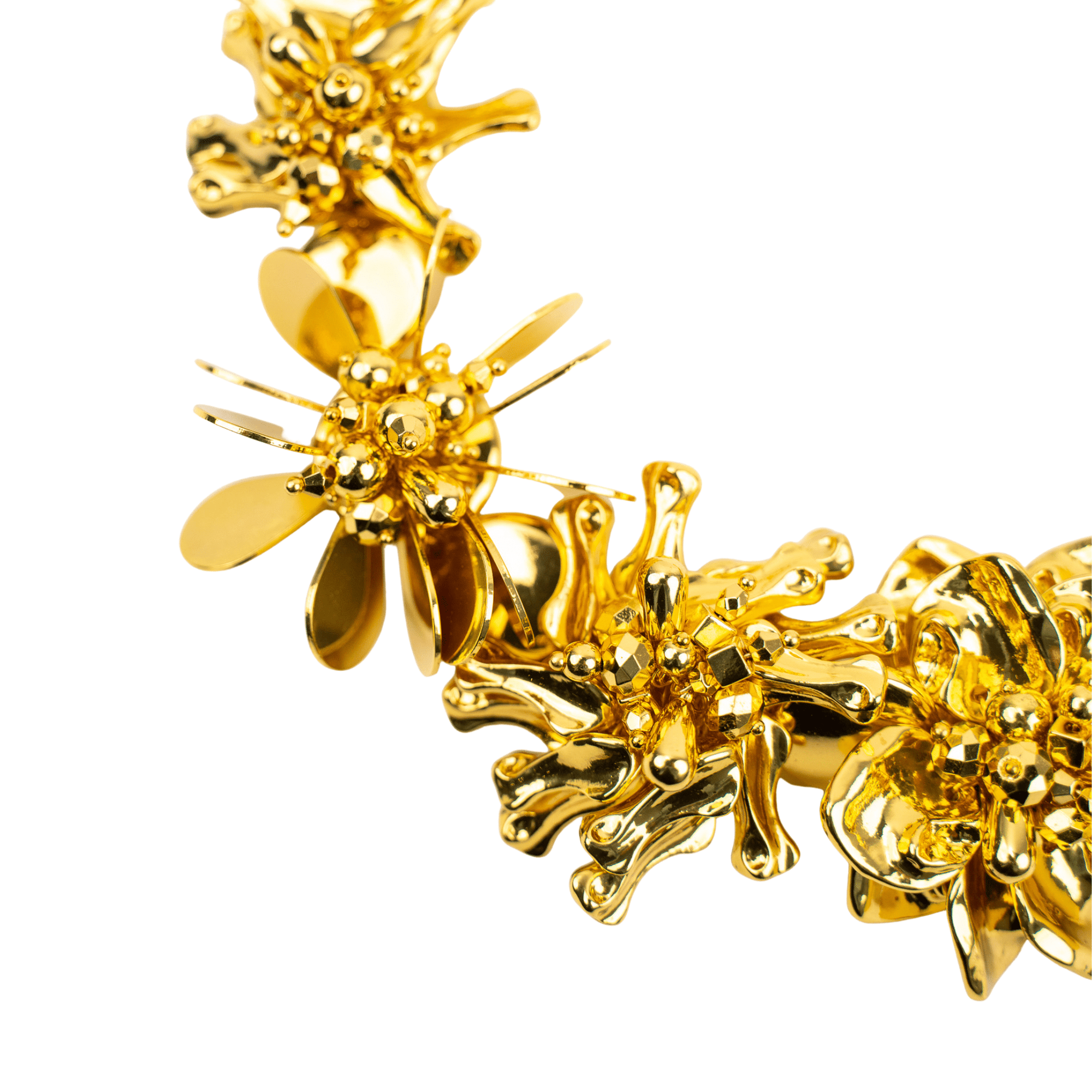 18k gold sculptural floral statement necklace with layered petals and reflective discs inspired by cascading wisteria blossoms worn on a woman's neckline