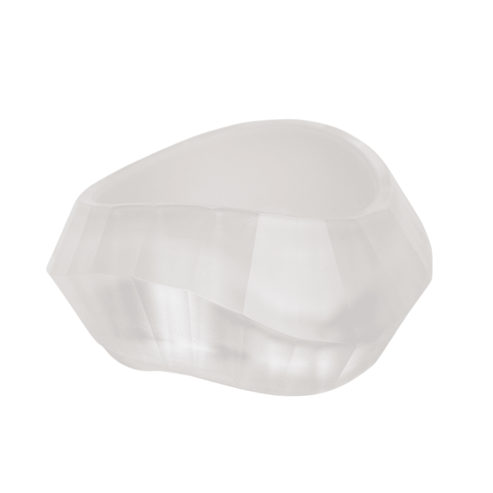 Frosted translucent white faceted resin bangle bracelet with sculptural geometric shape on a clean white background.
